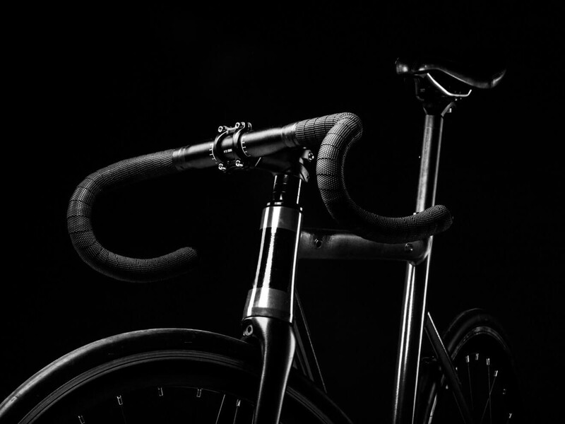Black race bike in a black room. Creative!